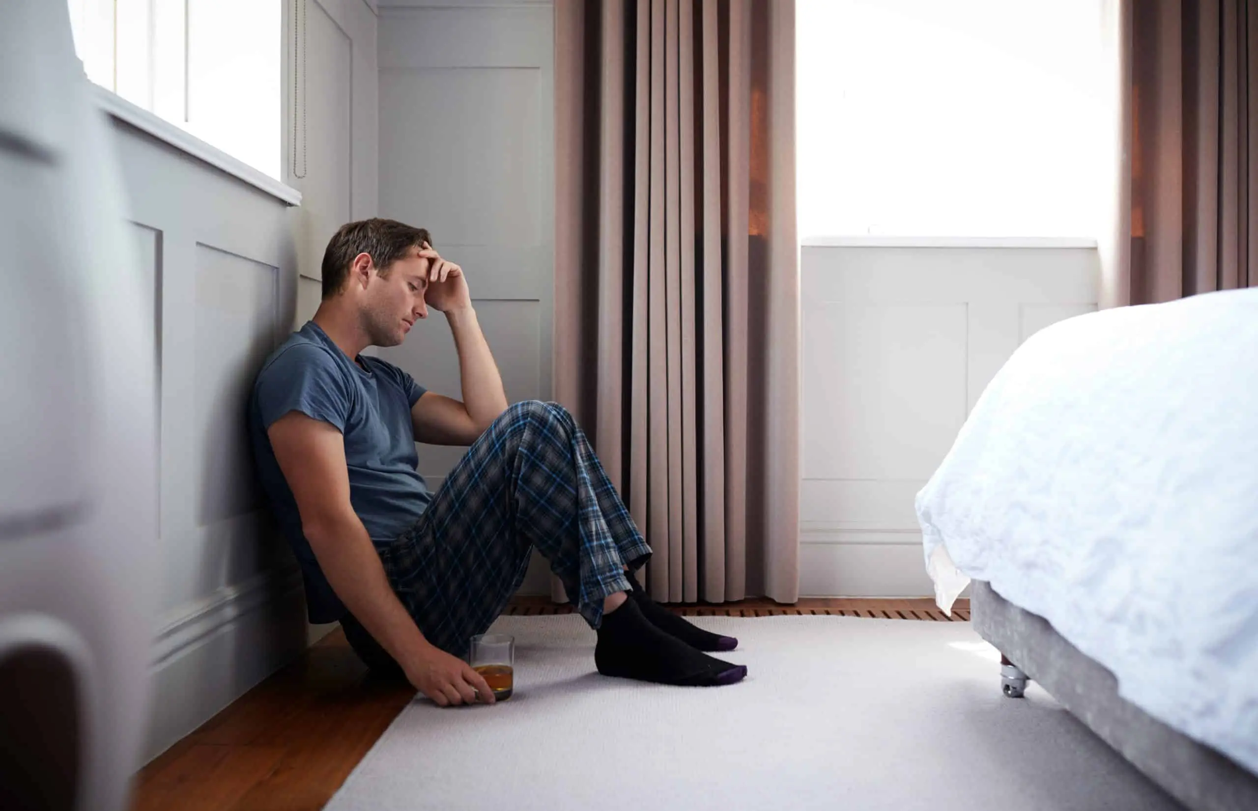 a man sitting on the floor