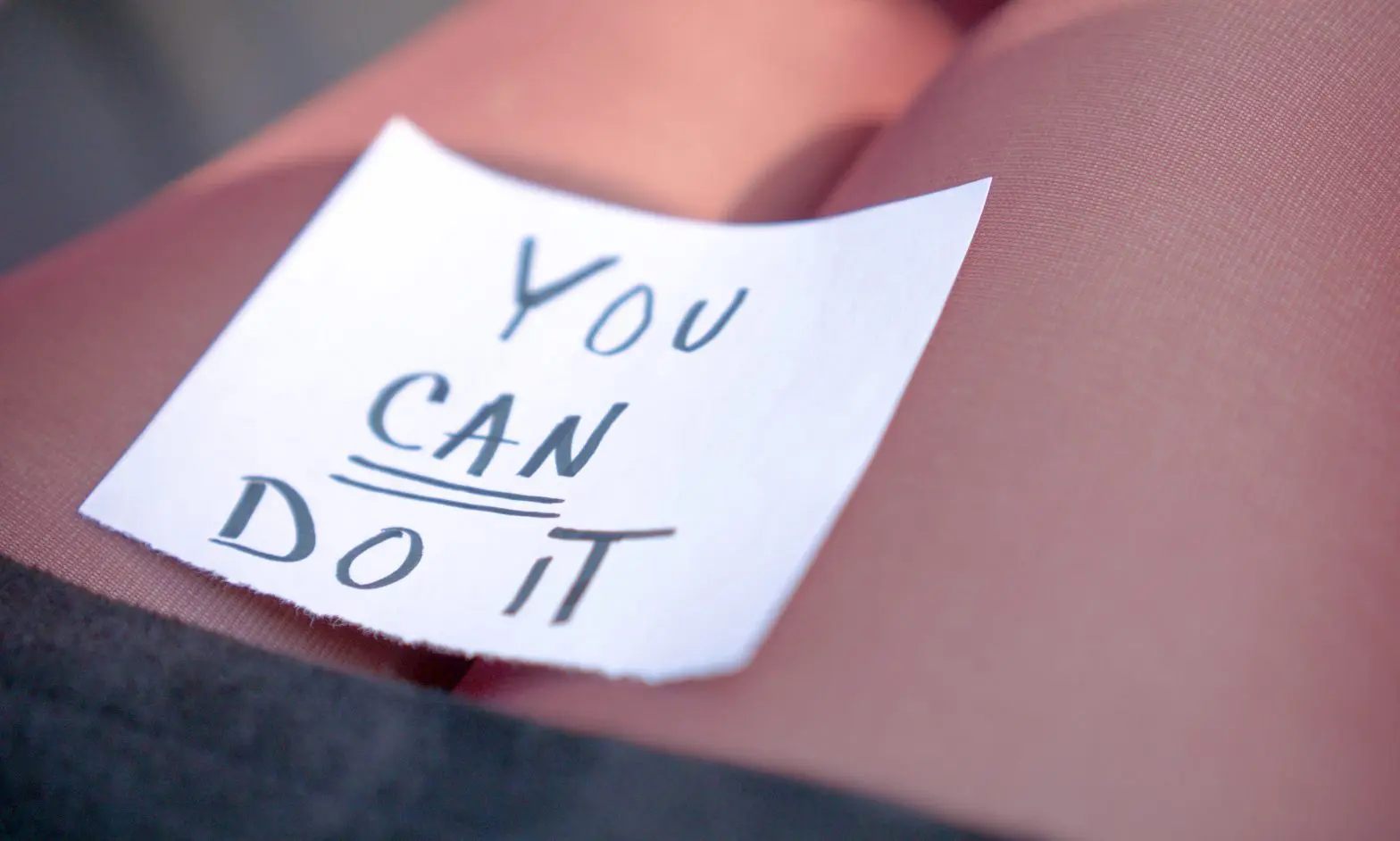 a note on a person's leg