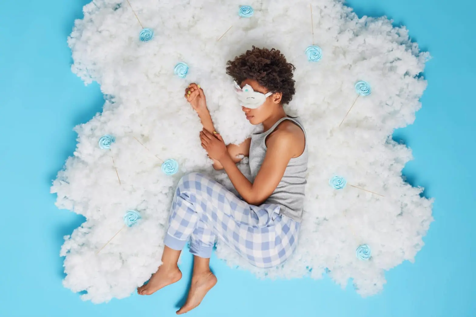 a person lying on the clouds