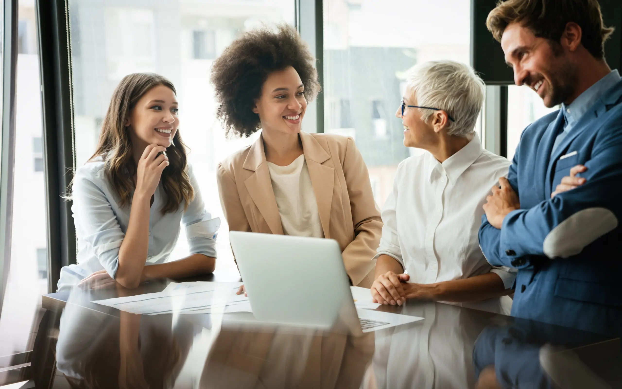 Group of multiethnic business people working at busy modern office scaled Finding a Job After Rehab