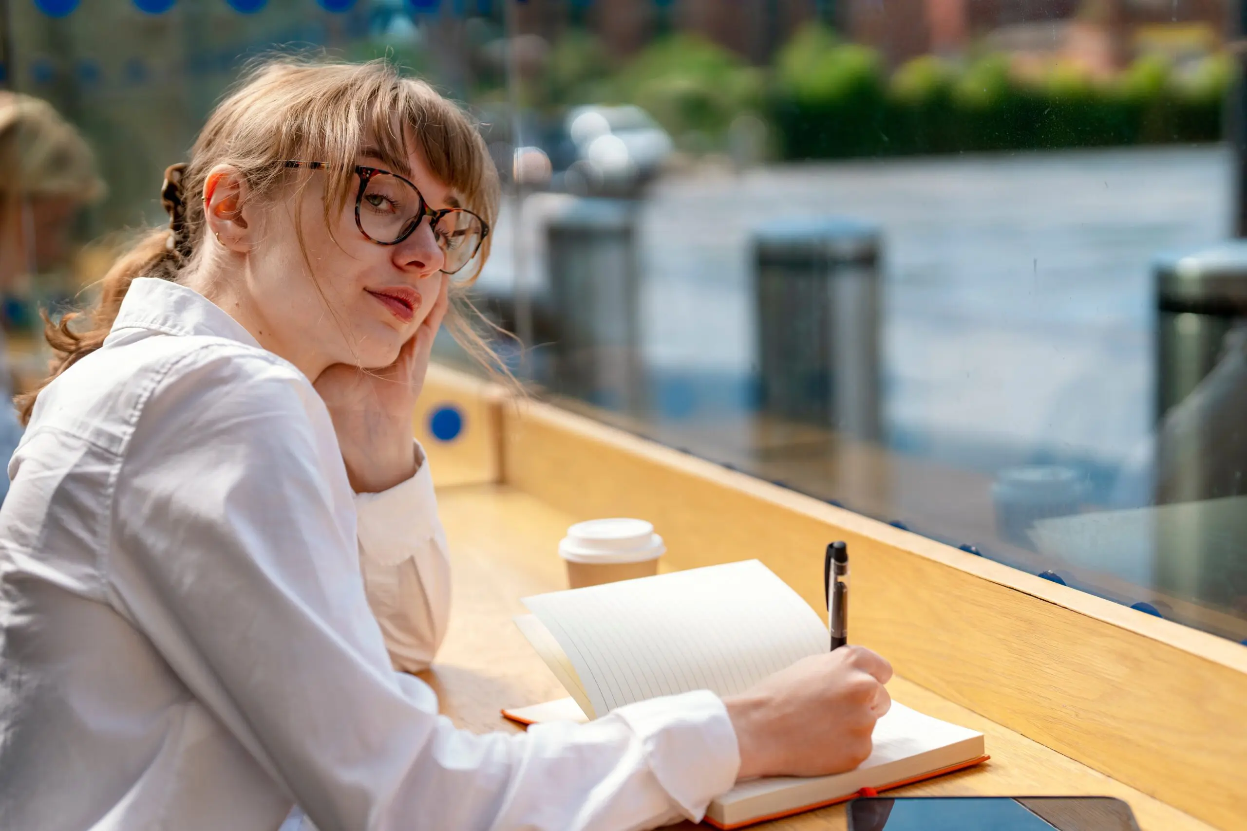 individual reflecting while surrounded by positive influences