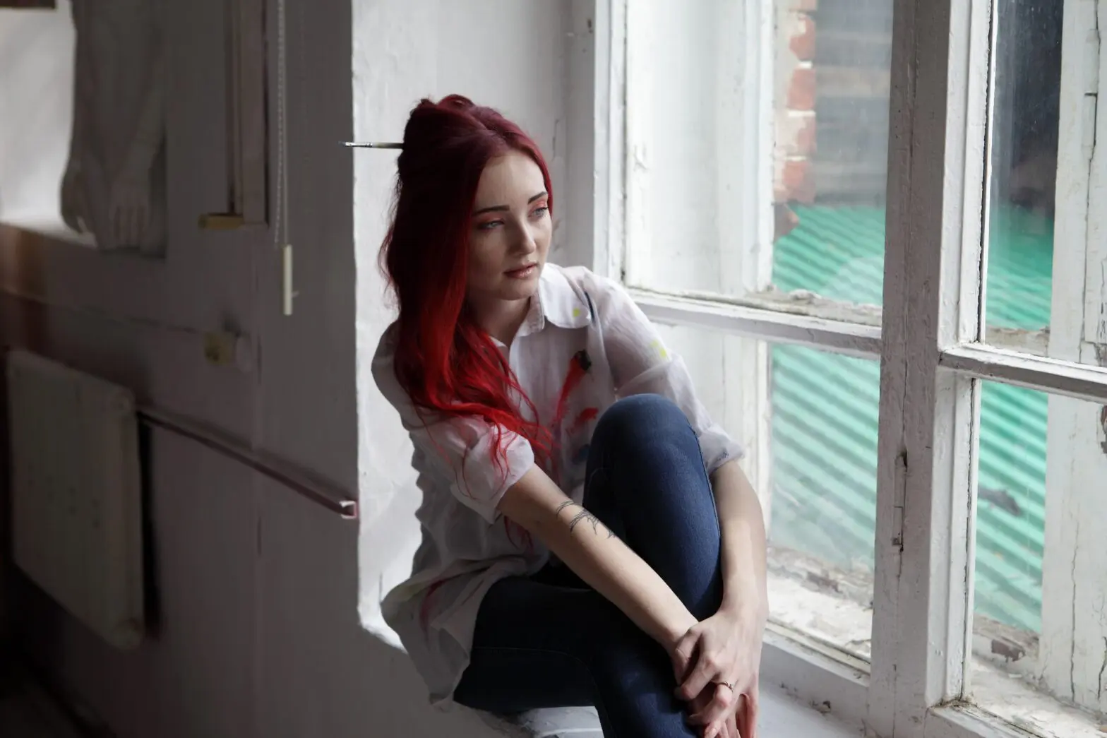 Person reflecting on forgiveness and emotional healing in recovery