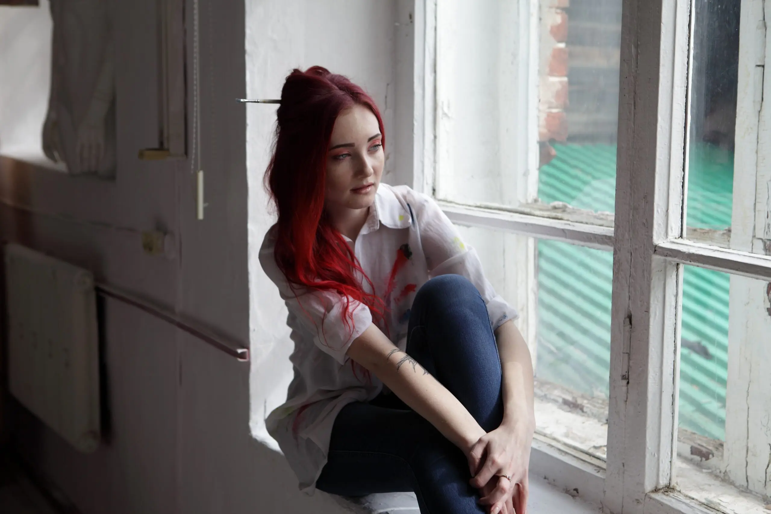 Person reflecting on forgiveness and emotional healing in recovery