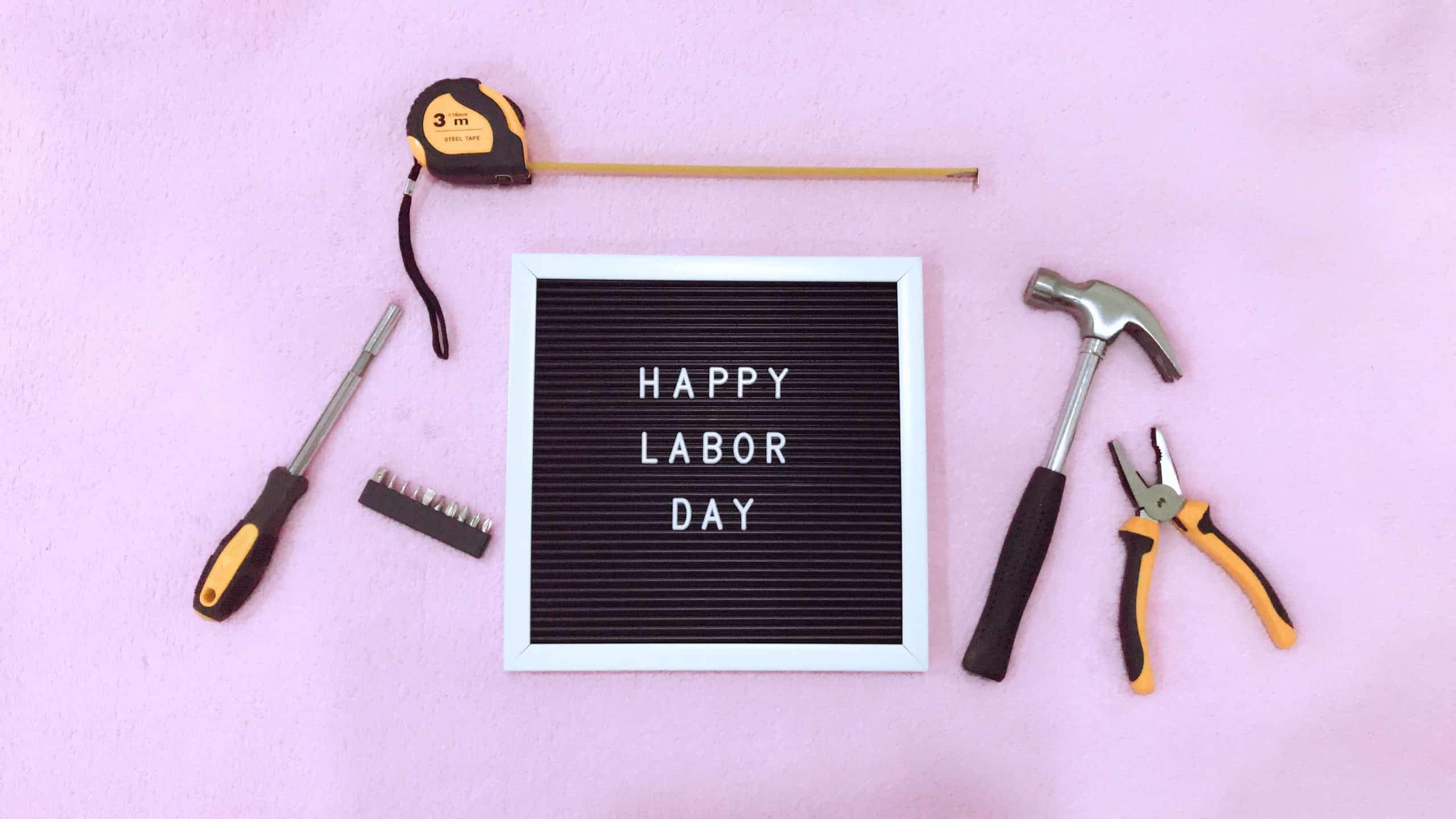 a letter board with tools on it