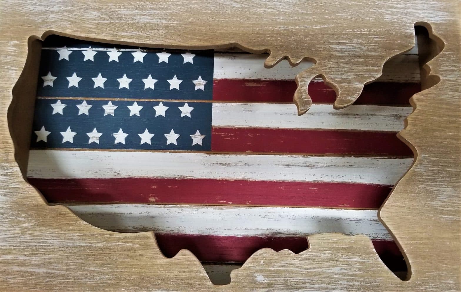 a wood frame with a flag in the middle