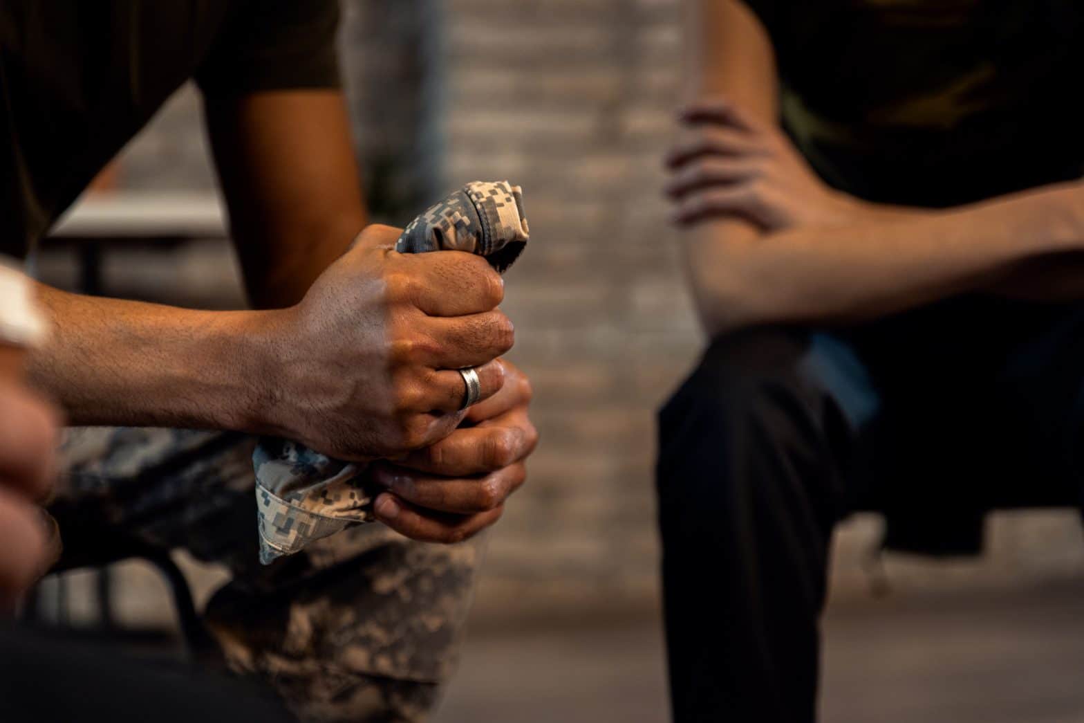 a man holding a folded cloth