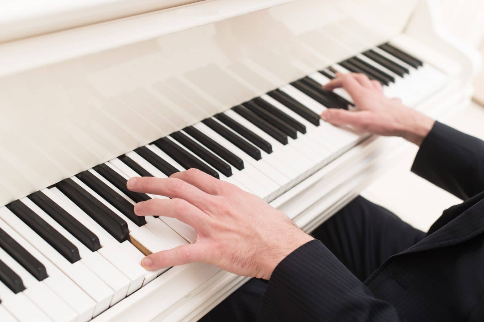 a person playing a piano
