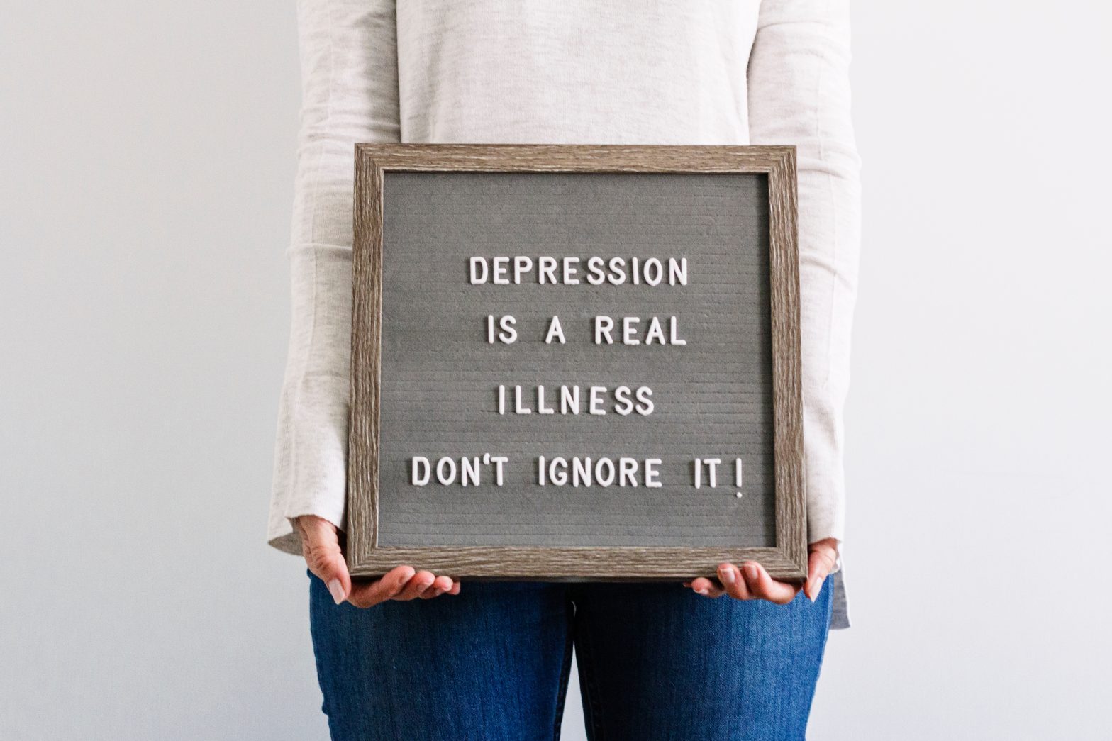 a person holding a sign