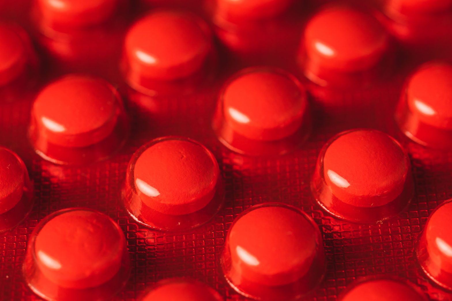 a close up of red pills