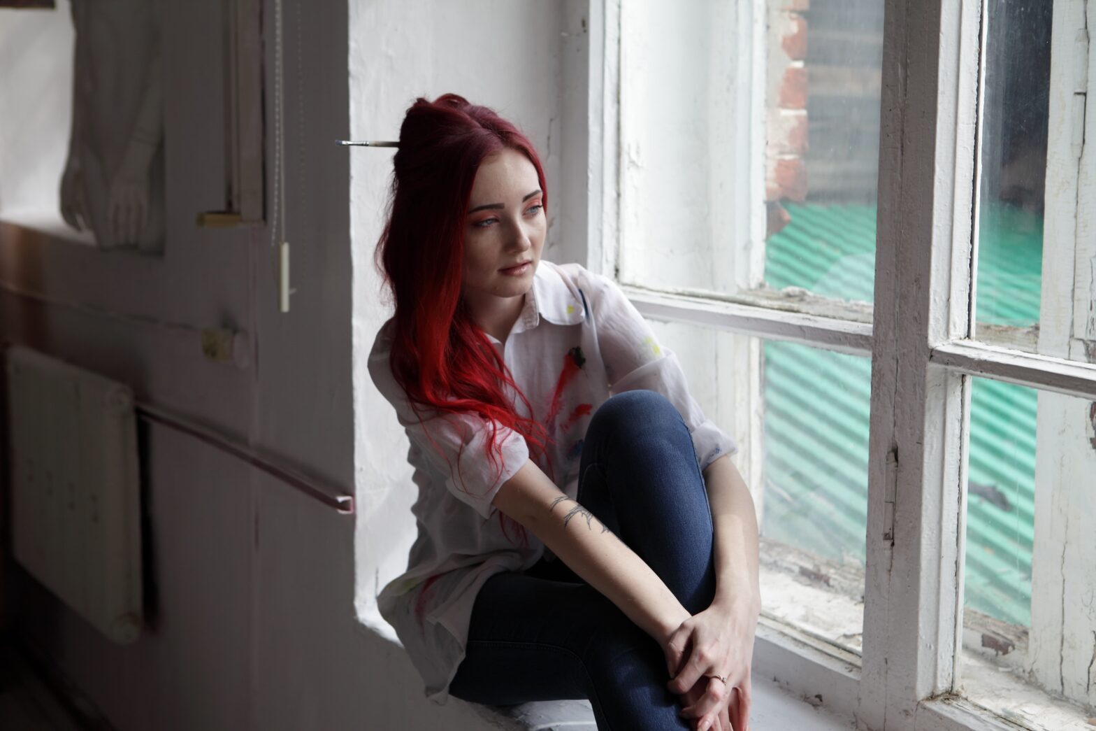 Person reflecting on forgiveness and emotional healing in recovery