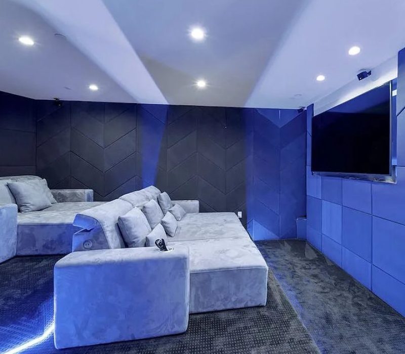 a room with a couch and a tv