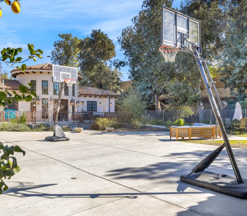 basketball court in the backyard of Vanity Wellness Center's sober living