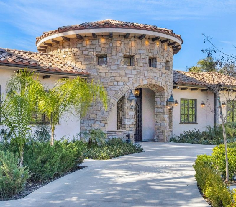 3T7A1496 a stone house with a round roof