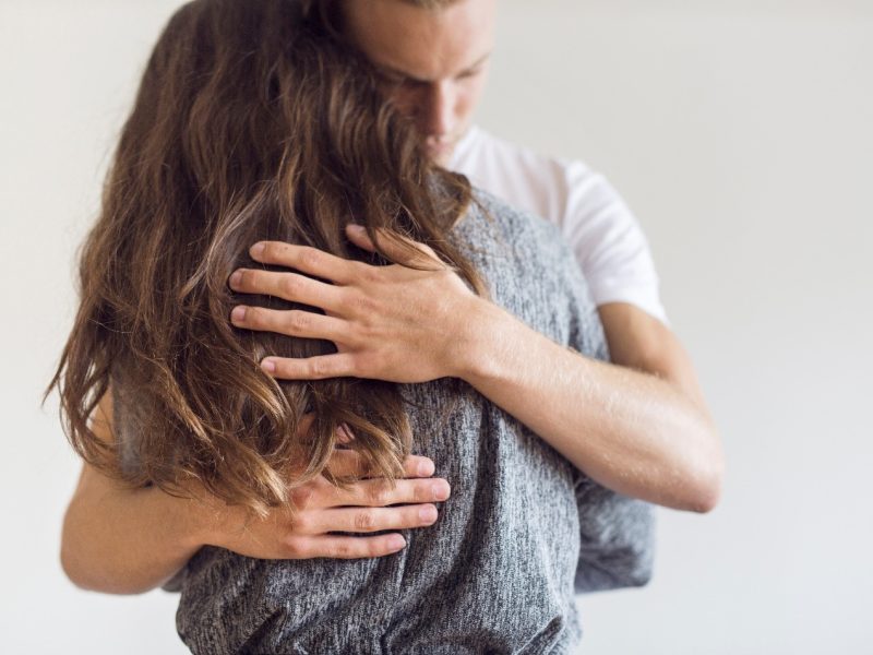 a man and woman hugging